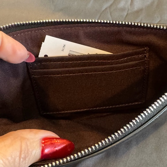 Coach Black Leather Wristlet with Embossed Logo. NWT